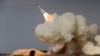 FILE -- A long-range S-200 missile is fired in a military drill in the port city of Bushehr, on the northern coast of Persian Gulf, Iran, Dec. 29, 2016. 