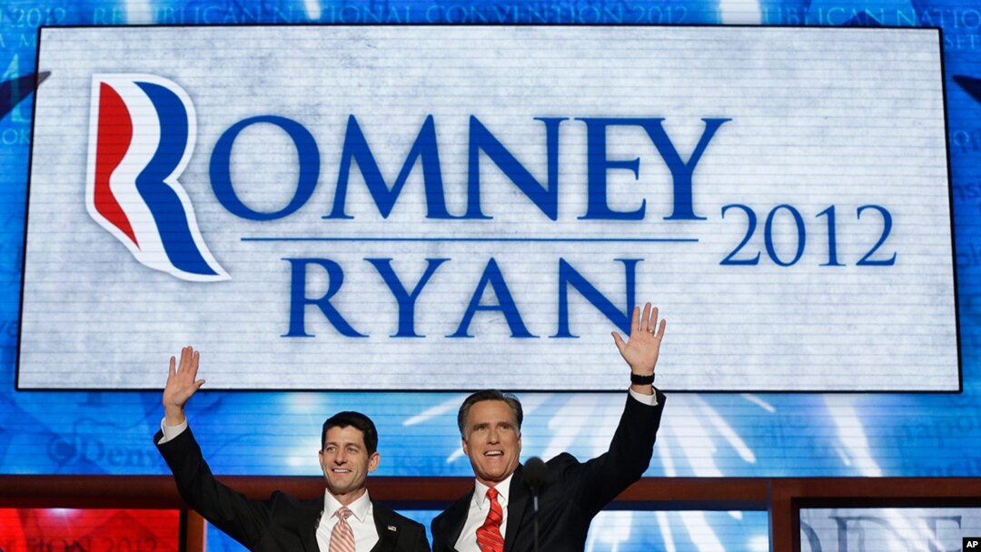 Republican presidential nominee Mitt Romney and vice presidential nominee Paul Ryan wave to delegates after speaking at the Republican National Convention in Tampa, Florida, August 30, 2012. 