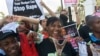 FILE - Protesters call for the South African government to act against rape and abuse of women on February 27, 2013, in Cape Town. 