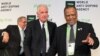 Newly-appointed World Anti-Doping Agency (WADA) president Craig Reedie, center, with his vice-president Makhenkesi Stofile, right, and the outgoing president John Fahey, in Johannesburg, Nov. 15, 2013.