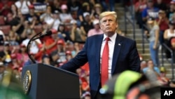 President Donald Trump speaks at a campaign rally in Sunrise, Fla., Tuesday, Nov. 26, 2019.