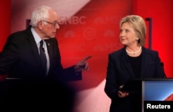 FILE: Democratic U.S. presidential candidate Senator Bernie Sanders speaks directly to former Secretary of State Hillary Clinton during the Democratic presidential candidates debate at the University of New Hampshire, Feb. 4, 2016.