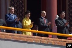 Qozog'iston, Janubiy Koreya, Rossiya va Xitoy rahbarlari paradni tomosha qilmoqda