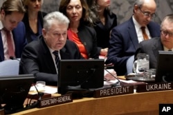 FILE - Ukraine's U.N. Ambassador Volodymyr Yelchenko addresses the body during a meeting at the United Nations, Feb. 2, 2017.