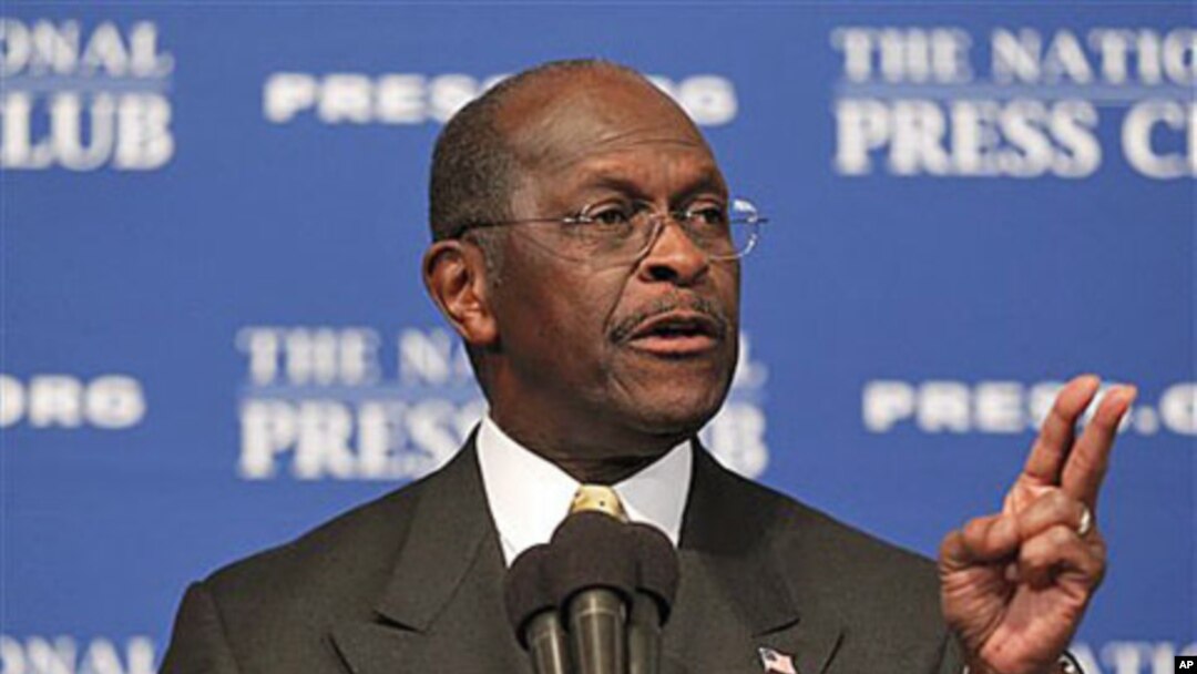 Republican presidential candidate Herman Cain answers questions at the National Press Club in Washington (file photo)