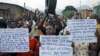 Protesters march who are against Burundi President Pierre Nkurunziza and his bid for a third term, in Bujumbura, Burundi, June 4, 2015.
