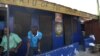 Business has fallen off at the Ghana Private Roads Transport Union office in Buduburam, shown Oct. 28, 2014. (Chris Stein/VOA)