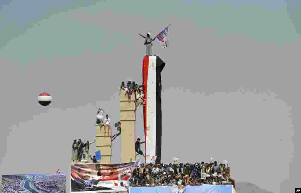 Supporters of former Yemeni President Ali Abdullah Saleh attend a ceremony to celebrate the 35th anniversary of the founding of the Popular Conference Party, in Sana'a.