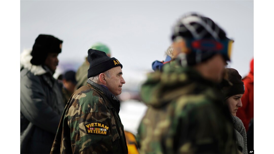 Vietnam Army veteran Dan Luker of Boston attends a briefing for fellow veterans at the Oceti Sakowin camp where people have gathered to protest the Dakota Access oil pipeline in Cannon Ball, N.D., Dec. 3, 2016.
