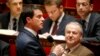 French PM Manuel Valls (L) speaks at the start of a parliament debate on a constitutional reform bill that would make it easier to decree a state of emergency, at the National Assembly in Paris, Feb. 5, 2016.