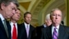 From left, Sen. Roy Blunt, R-Mo., Sen. John Barrasso, R-Wyo., Sen. John Thune, R-S.D., Senate Minority Whip John Cornyn of Texas, and Senate Minority Leader Mitch McConnell R-Ky., pause during a news conference on Capitol Hill in Washington, Nov. 18, 2014
