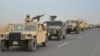 Egyptian Army armored vehicles are seen on a highway traveling toward north Sinai during a launch of a major assault against militants, in Ismailia, Egypt, in this undated handout picture made available by Egypt's Ministry of Defense Feb. 9, 2018.