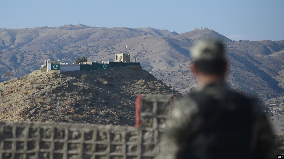 FILE - A Pakistani army soldier stands guard at a border post in Ghulam Khan, North Waziristan, on the border between Pakistan and Afghanistan, Jan. 27, 2019.