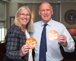 FILE - Principal Deputy Director of National Intelligence Sue Gordon and Director of National Intelligence Dan Coats.