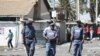 FILE - Police patrol the streets after overnight unrest and looting in Alexandra township, Johannesburg, South Africa, Sept. 3, 2019.