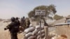 FILE - Cameroon soldiers stand guard at a lookout post as they take part in operations against Boko Haram in Cameroon. 