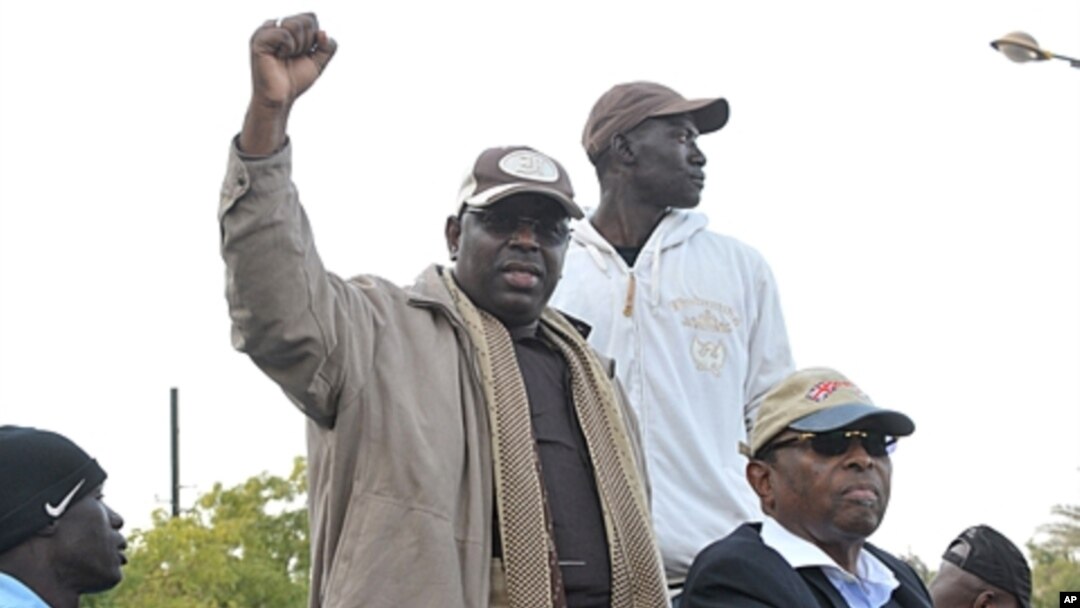 Senegalese opposition leader Macky Sall gestures as he attends a demonstration demanding that President Abdoulaye Wade drop plans to seek a third term in Dakar, Senegal (file photo)