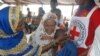 FILE - Yaouba Hamadou, center, a 13-year-old Central African Republic refugee, cries in the arms of relatives as he arrives in Lolo, east Cameroon, April 21, 2017.