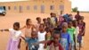 FILE - Children get ready to enter a class room in Yakouta, Burkina Faso. 