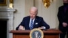 FILE - In this Jan. 27, 2021 photo, President Joe Biden signs an executive order on climate change, at the White House.