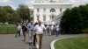Members of the media, and others, are evacuated from the White House in Washington, June 9, 2015. 