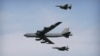 A U.S. Air Force B-52 bomber flies over Osan Air Base in Pyeongtaek, South Korea, Jan. 10, 2016. The U.S. flew two B-52 bombers over the South China Sea Tuesday to discourage China from militarizing the Spratly archipelago.