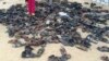 FILE - Discarded shoes of victims remain outside al-Rawdah mosque in Bir al-Abed, northern Sinai, Egypt, a day after attackers killed hundreds of worshippers, Nov. 25, 2017.
