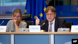 European Parliament Brexit Coordinator Guy Verhofstadt, right, addresses a European Parliament committee at the European Parliament in Brussels, Belgium, Aug. 30, 2017.