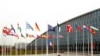 Flags of NATO member countries are seen at the Alliance headquarters in Brussels, Belgium, Nov. 26, 2019. 