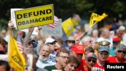 Opponents of President Barack Obama's Affordable Care Act rally on the west lawn of the U.S. Capitol in Washington September 10, 2013.