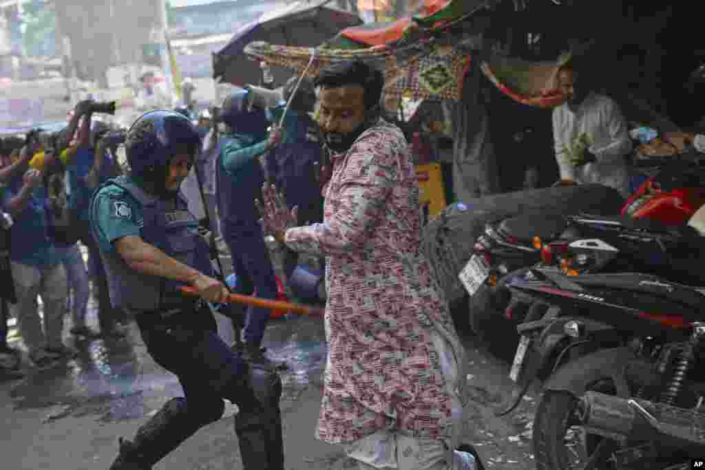 Politsiya "Hizb ut-Tahrir" guruhi tarafdorlarini tayoqlar bilan tarqatdi, Bangladesh