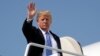 President Donald Trump waves as he boards Air Force One for a trip to West Virginia for a "Salute to Service" dinner, July 3, 2018, at Andrews Air Force Base, Maryland.
