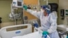 A medical worker at the US Department of Veterans Affairs (VA) Boston Healthcare system campus and medical center in West Roxbury, Massachusetts on January 11, 2022. 