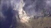 This photo made from footage taken from the Russian Defense Ministry official websiteNov. 2, 2015, shows a Russian airstrike hit a target in Syria. The Russian Defense Ministry said the strike was performed by an Su-34M bomber in Aleppo province. 