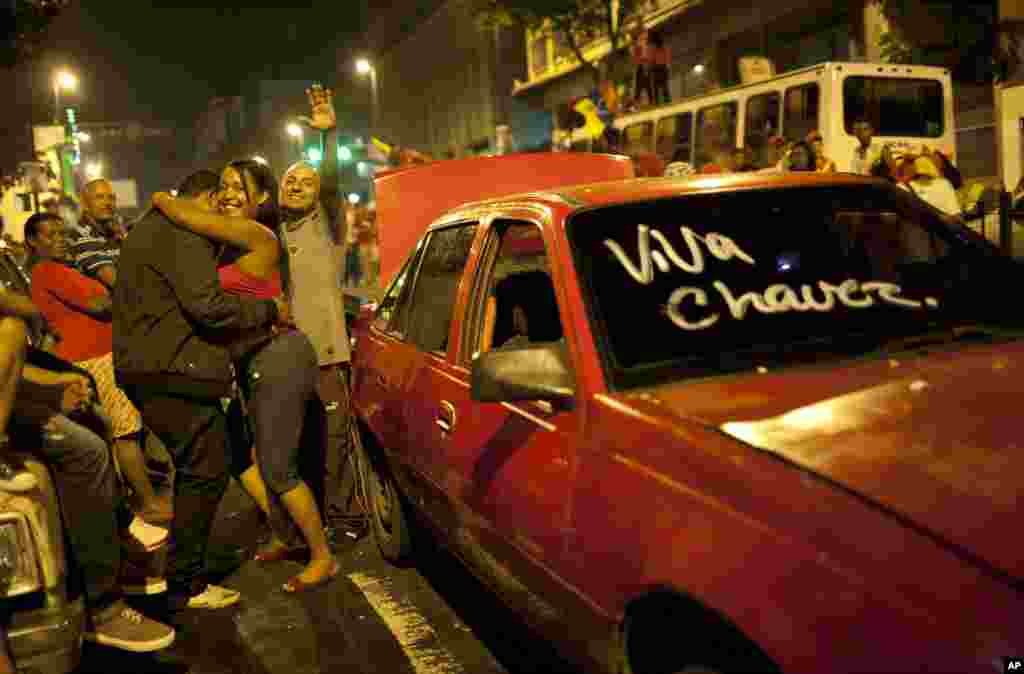 Supporters of Venezuela&#39;s President Hugo Chavez celebrate in downtown Caracas.