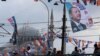 A banner of Turkish President Tayyip Erdogan and Turkey's ruling AK Party (AKP) flags hang over Galata bridge in Istanbul,, June 10, 2018. 