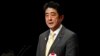 日本首相安倍晋三于2013年2月7日在东京举行要求北方四岛回归的集会上发表讲话