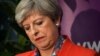 Britain's Prime Minister Theresa May waits for the result of the vote in her constituency at the count center for the general election in Maidenhead, June 9, 2017. 