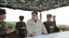 North Korean leader Kim Jong Un visits the Changrindo defensive position on the west front, in this undated picture released by North Korea's Central News Agency (KCNA), Nov. 25, 2019. 