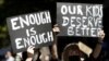 Thousands of people with placards and banners rally demanding justice for women in Sydney, March 15, 2021, as the government reels from two separate allegations.