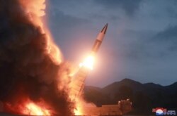 FILE - North Korea test fires a new weapon, in this undated photo released Aug. 11, 2019, by North Korea's Korean Central News Agency.
