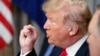 U.S. President Donald Trump gestures while speaking to NATO Secretary General Jens Stoltenberg during their bilateral breakfast, Wednesday, July 11, 2018 in Brussels, Belgium.