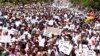 Thousands of Mozambicans take part in a nationwide march for peace on October 31, 2013 in Maputo, amid violent clashes between government troops and rebels who have taken up arms two decades after civil war.