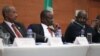 FILE - (From L) Chairman of IGAD mediation team Seyoum Mesfin, S. Sudan leader of the opposition's negotiating team Gen Taban Deng and IGAD special Envoy Mohammed Ahmed Mustefa listen during the opening ceremony of a round of S. Sudan peace talks in Addis Ababa, Feb. 11, 2014.