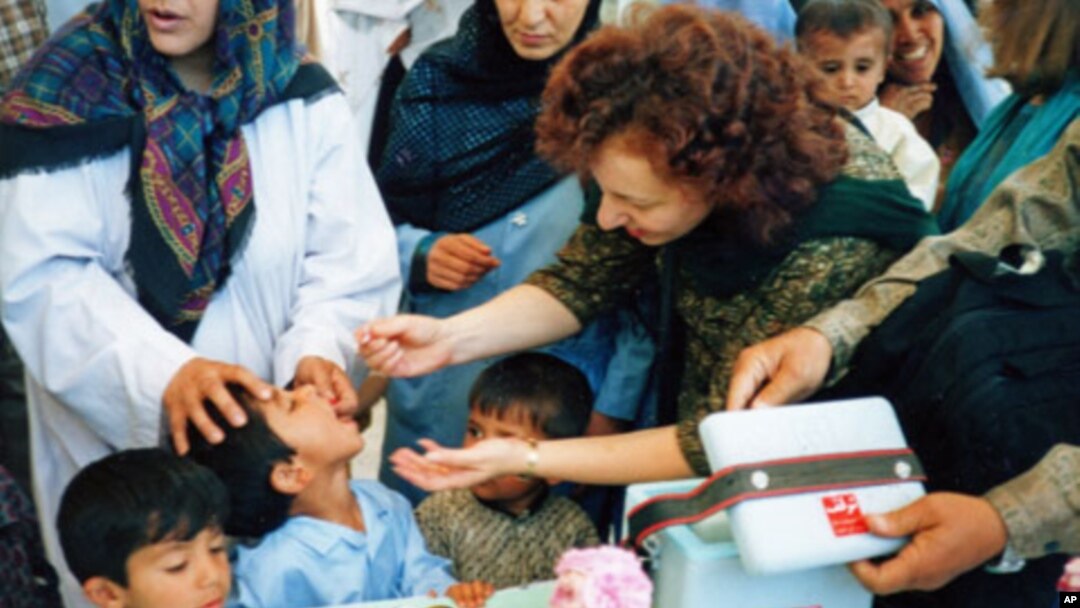 The United States global polio eradication program commits $1.4 billion through USAID and the Centers for Disease Control and Prevention. Here, Ellyn Ogden immunizes a child in Kabul, Afghanistan.