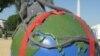 Globes showing environmental challenges are lining the National Mall for Earth Day activities.