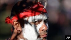 Russell Dawson of the Koomurri Aboriginal Dancers participates in a smoking ceremony during Australia Day ceremonies in Sydney, Jan. 26, 2021. 