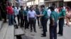 Bangladeshi police officers are seen investigating at the location where three motorcycle-riding assailants attacked secular student activist Nazimuddin Samad, in Dhaka, Bangladesh, April 7, 2016.