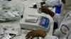 Employees inspect medication tablets produced at Azal Pharmaceutical Industries in Khartoum, (File photo).
