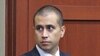 George Zimmerman, right, enters the courtroom, April 20, 2012, during a bond hearing in Sanford, Florida.